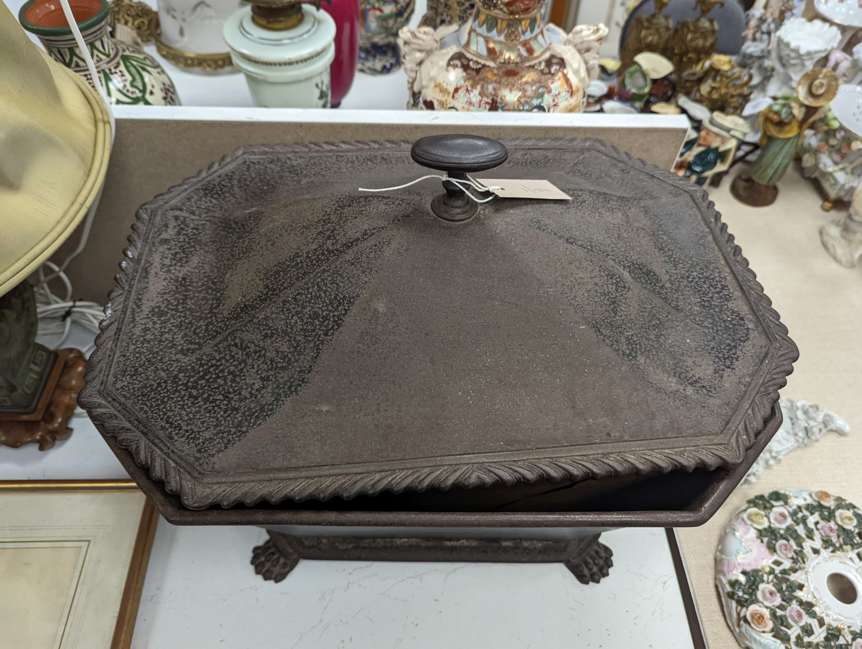 An iron wine cooler/coal box, 47 cms high.